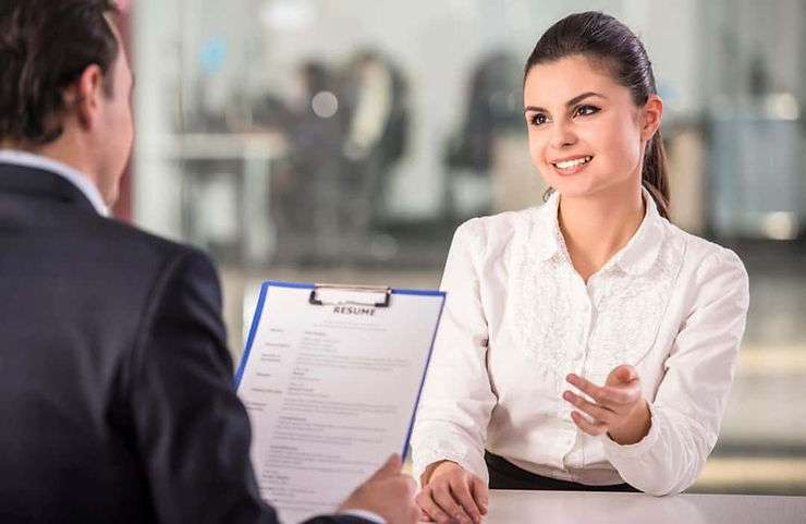 Woman talking about resume content at interview