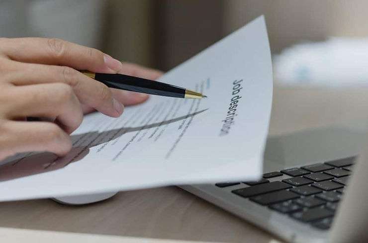 Person customizing printed job description document