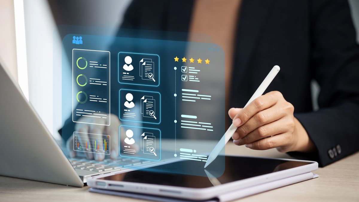 Person writing on a tablet with a tablet pen