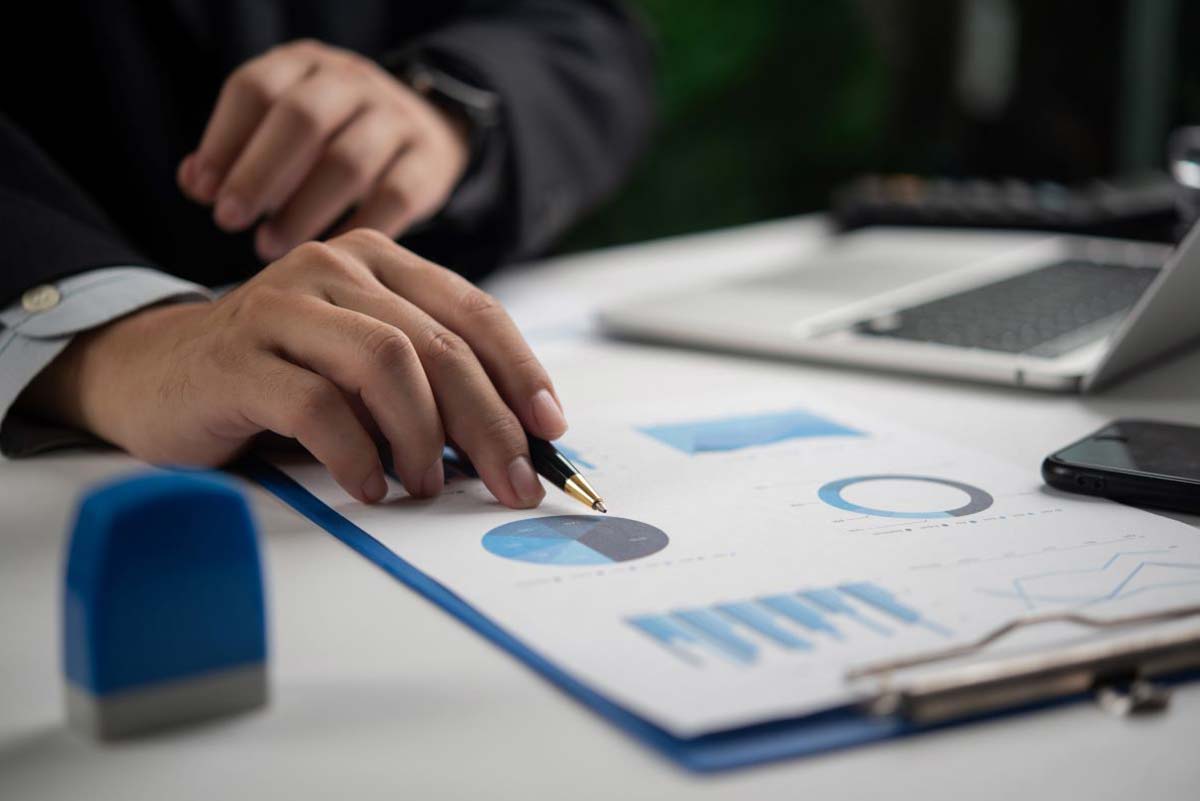 HR professional analyzing ROI metrics for job description software to improve hiring efficiency and reduce costs